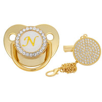 Chupeta de luxo cor ouro com a letra inicial do seu filho(a)