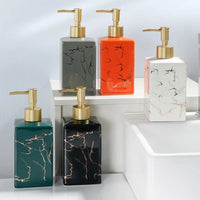 Frasco de loção de cerâmica marmorizada banhado a ouro de luxo