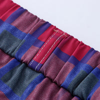 Calças xadrez casual com zíper elástico na cintura