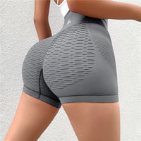 Shorts Fitness sem costura com forte modelagem